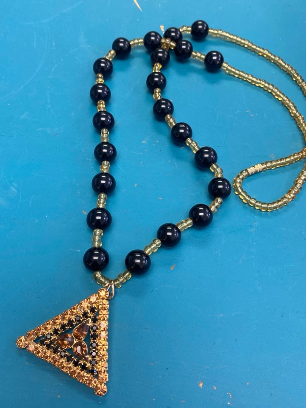 Elegant Black Bead Necklace with Gold Triangle Pendant - Women Jewelry